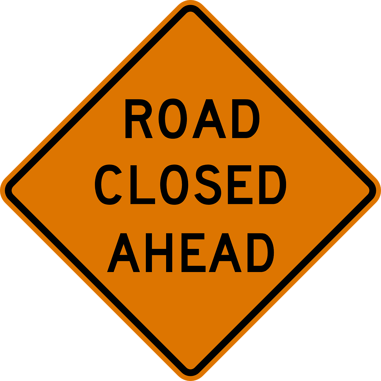 Sign reads Road Closed Ahead