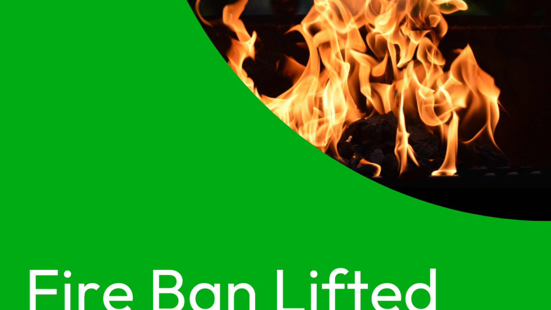 Fire ban lifted notice with flames in the background.