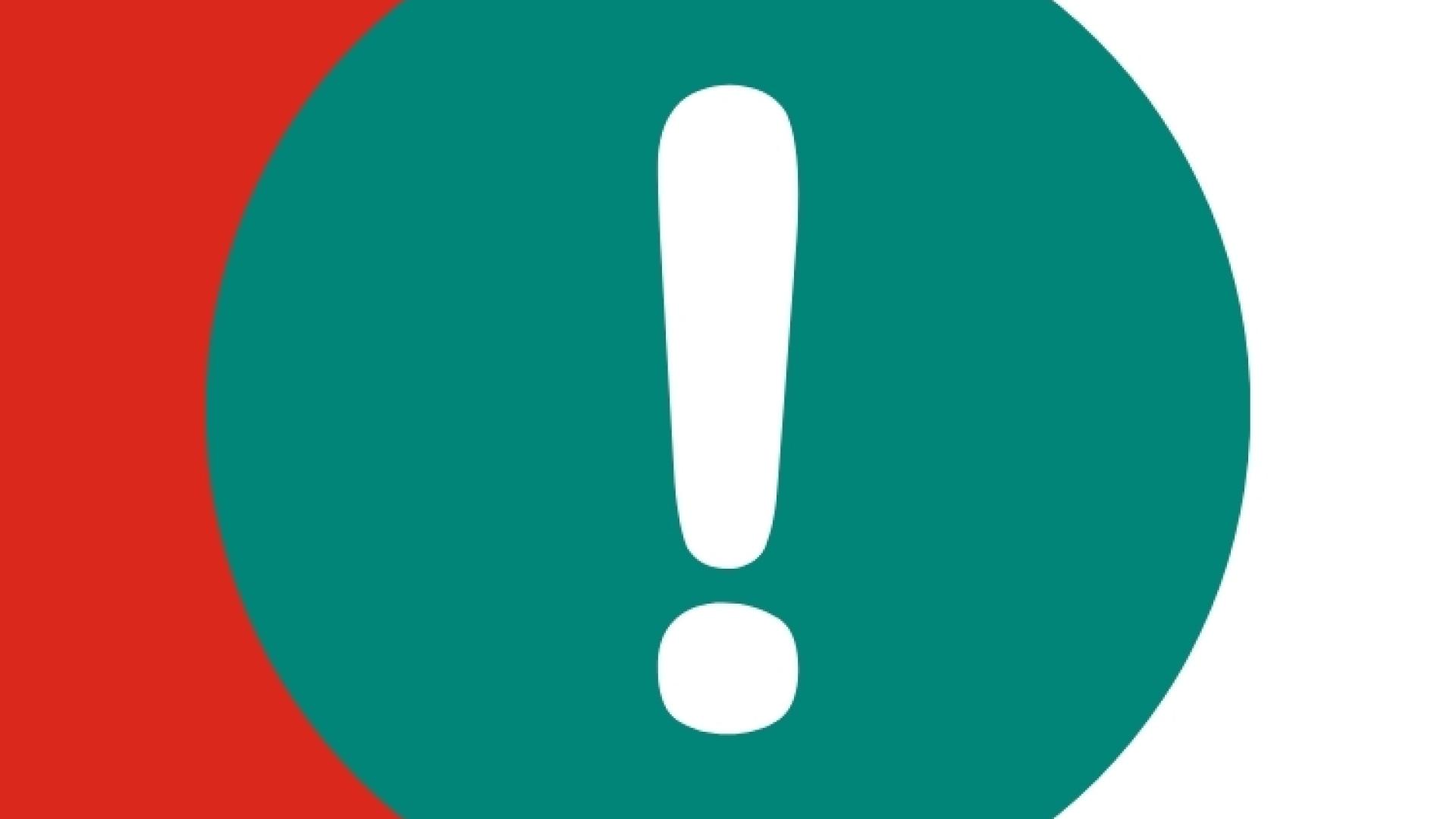 Exclamation point in a teal circle