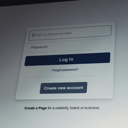 close up on a online portal with username and password signin field with button login