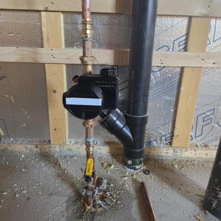 water meter in a new construction in a basement