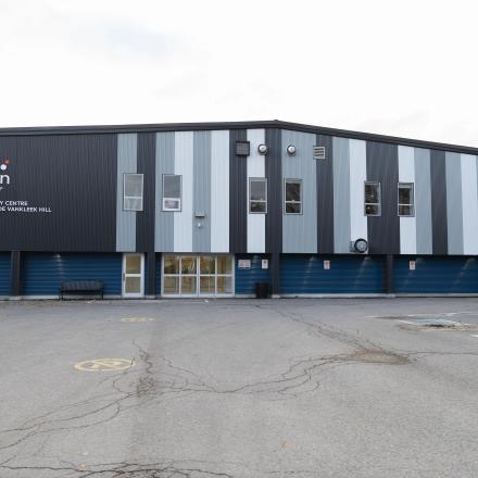 community centre with grey, blue and white outdoor paneling