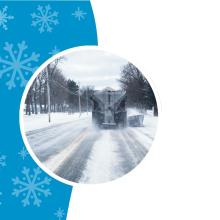 Snowplow clearing a snow-covered road during winter, framed within a blue graphic design with snowflakes.