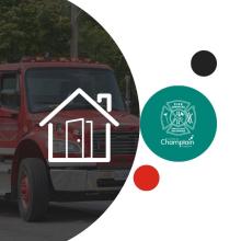 A circular graphic showing the front of a red fire truck with a white house icon overlaid, alongside the Township of Champlain Fire Services logo