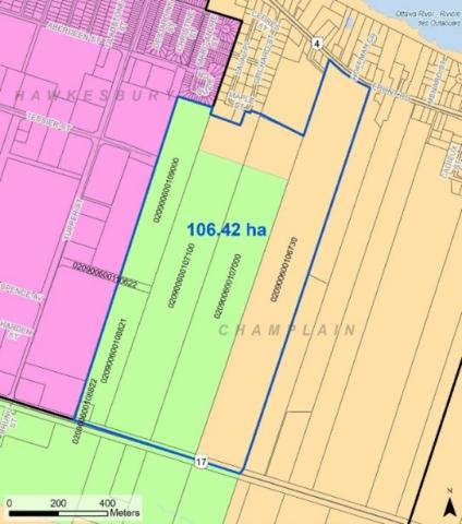 Map highlighting a green area labelled 106.42 hectares, surrounded by pink and yellow zones.
